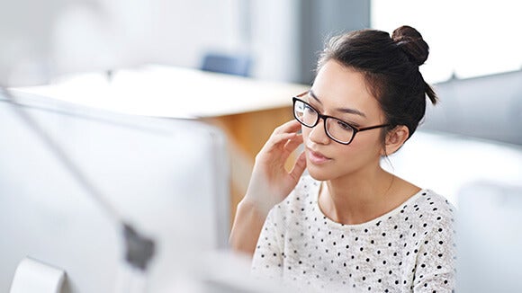 woman looking at computer woman looking at computer