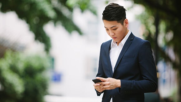 male on phone male on phone with blurry background