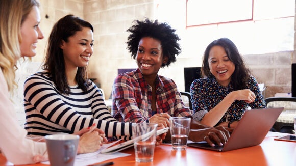women talking at table women talking at table