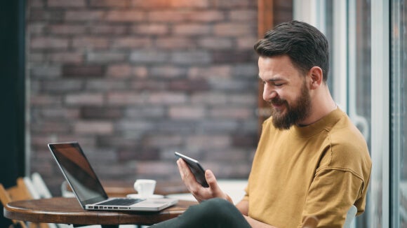 woman smiling on phone