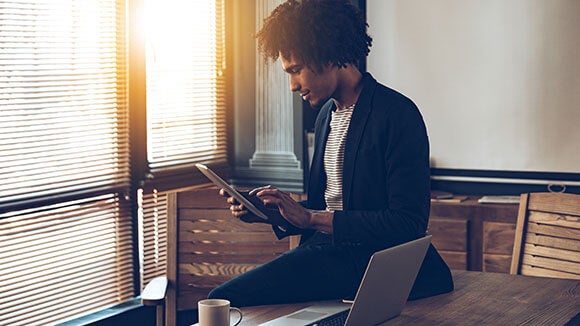 man using tablet man using tablet