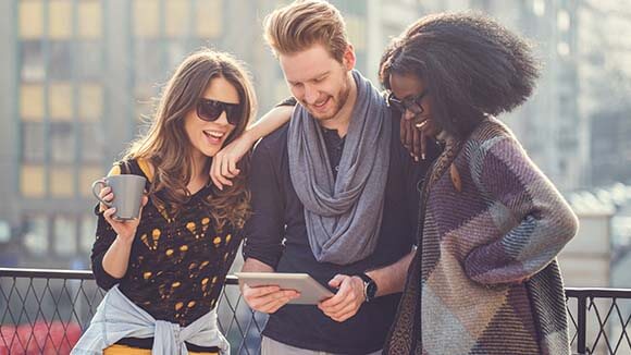 three friends on a tablet