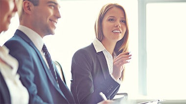 woman asking a question at a meeting woman asking a question at a meeting