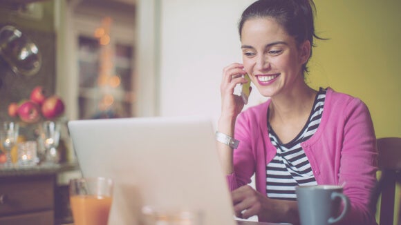 woman smiling on phone