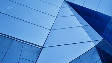 Blue modern building with sharp angles