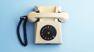 retro phone with blue background