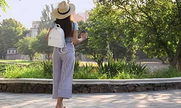 Woman walking around park