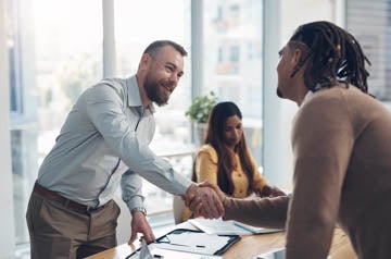We have a deal. Cropped shot of two handsome businessmen shaking